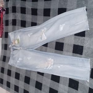 Distressed jeans with pearls